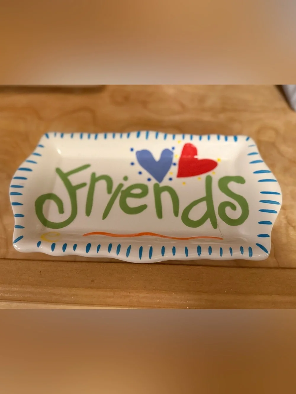 Ceramic trinket tray by Coton Colors Express that says Friends